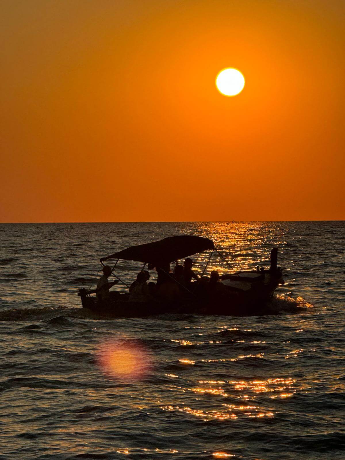 Guests enjoying a beautiful sunset tour with Rovinj Dolphin Excursion, capturing the serene beauty of Rovinj's coastline. A perfect evening on the water with Rovinj Dolphin Excursion, where guests enjoy stunning views and great company.